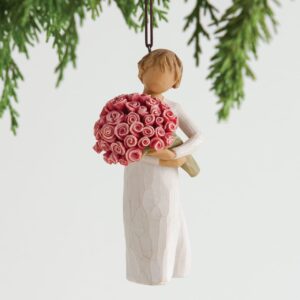 ornament - Abundance - willow tree. Figur som holder en stor bukett med røde roser